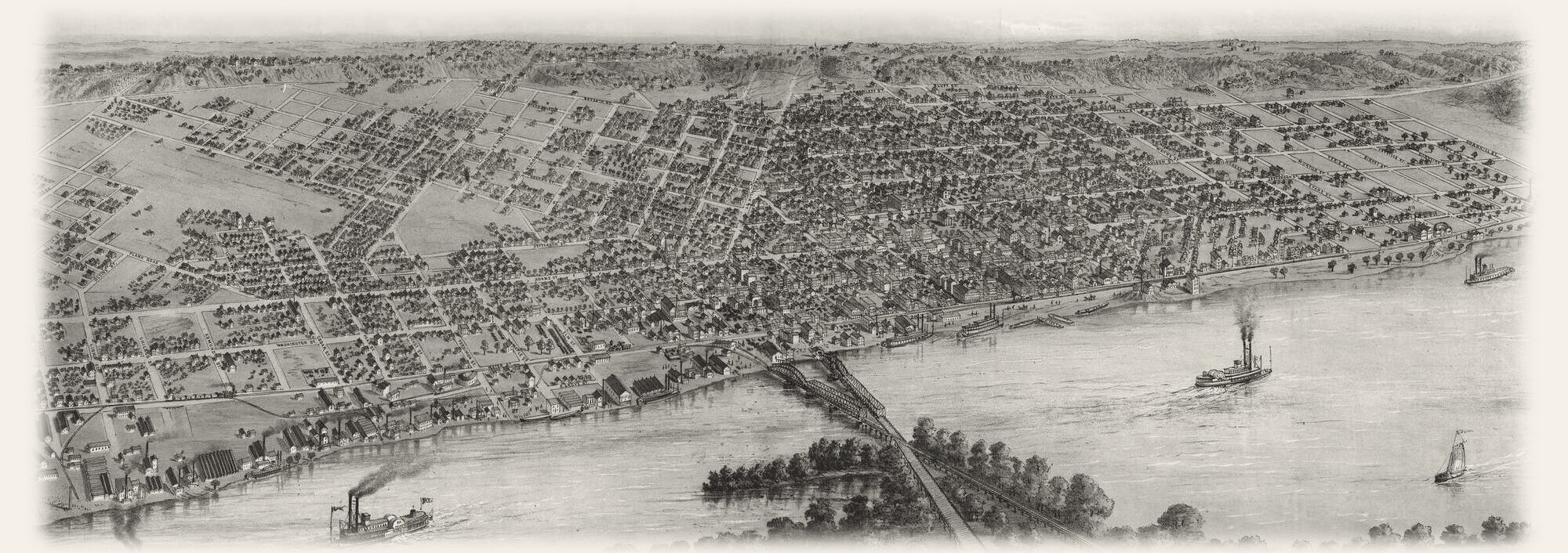 A bird's-eye view of Peoria in 1867: the city's grid of streets running up from the Illinois River, with steamboats on the water and the bridge to the east bank.
